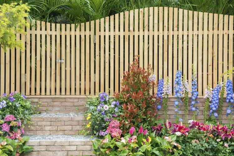 Is it cheaper to build your own fence?